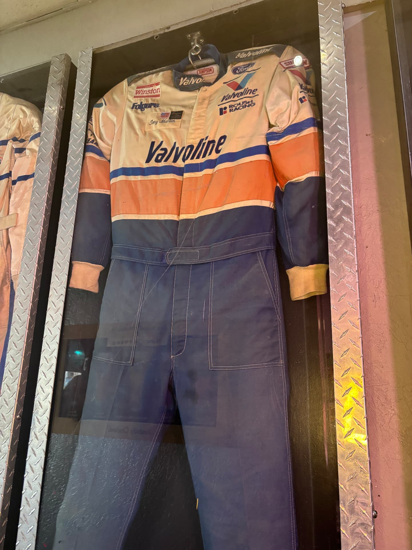 Mike Skinner's authentic racing firesuit on display at Cruisin Café