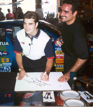 Gilbert and Jeff Gordon signing a tile, next time you are in Cruisin look up!