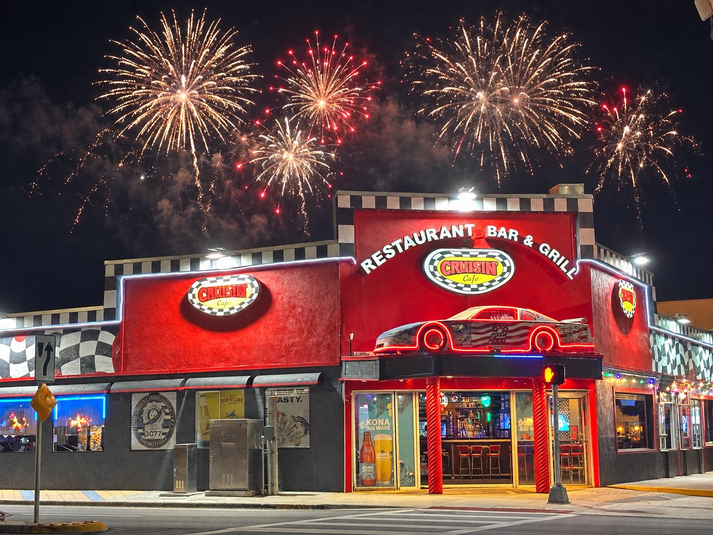 Fireworks over the Cruisin Café building at night