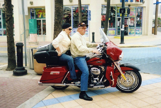 Robert Yates and his wife roll into Cruisin' on their hog.
