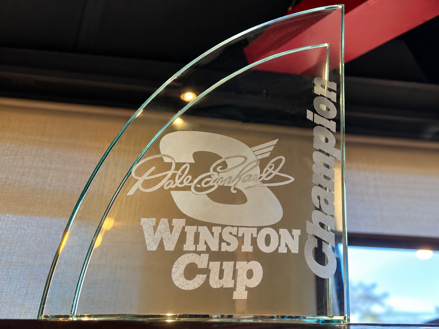 Etched-glass Dale Earnhardt Winston Cup Champion trophy on display at Cruisin Café