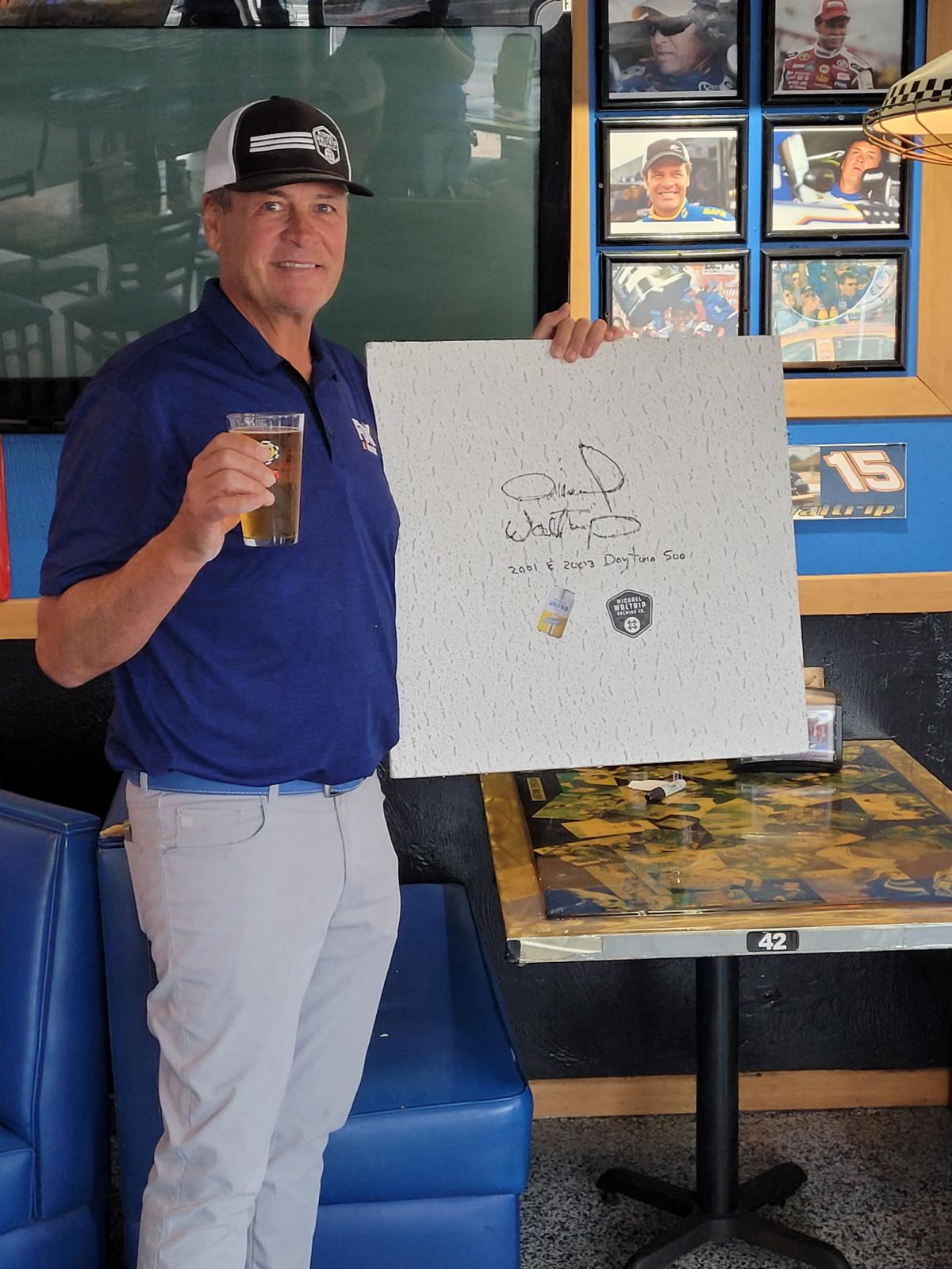 Michael Waltrip with his signed ceiling tile — 2001 & 2003 Daytona 500 winner.