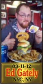 Cup Burger Challenge finisher holding their gold name plaque at Cruisin Café
